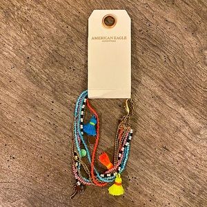 Multi strand beaded bracelet. Adjustable size